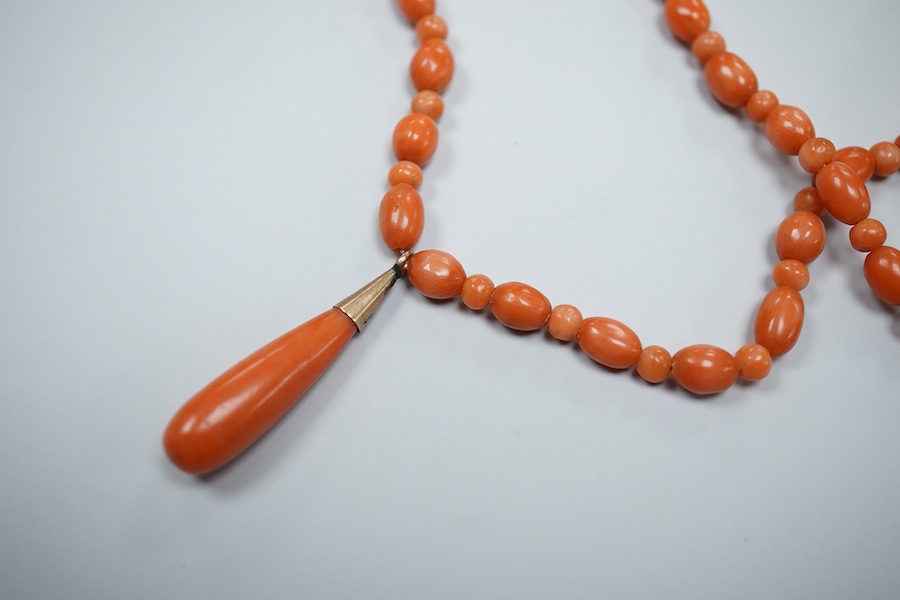 Two coral necklaces and a group of costume jewels, comprising: two coral bead necklaces, each with a gold clasp, combined gross weight approximately 35 grams; together with a simulant pearl necklace and pair of earrings